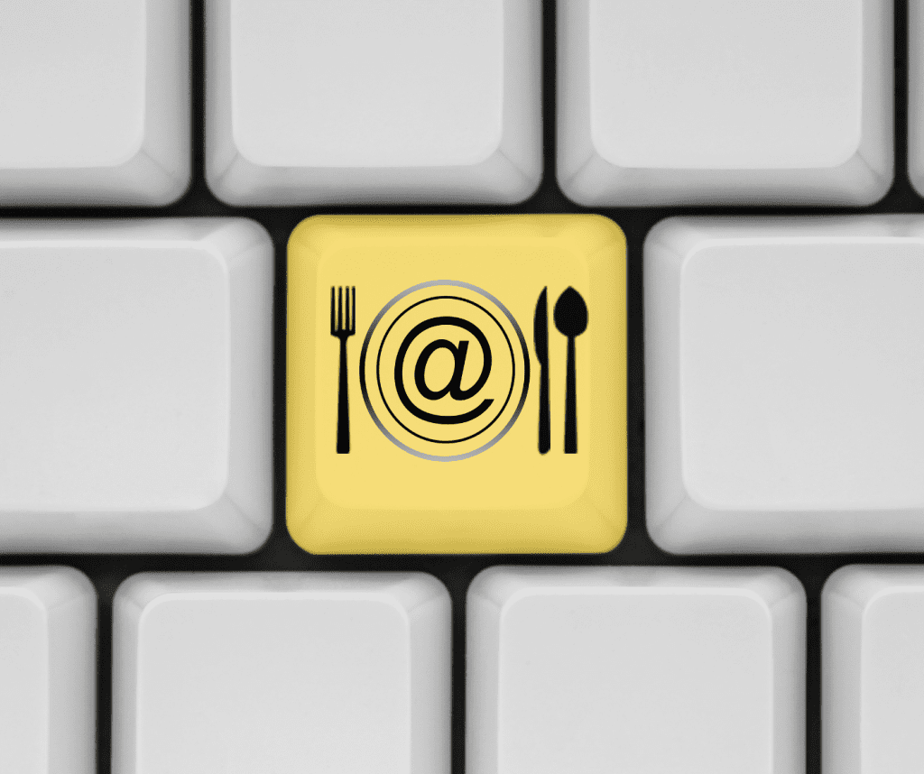 Mobile App For Restaurants - 10 Basic Features To Check Out 4 A key on a keyboard showing fork, spoon, and knife that entails easy food order tracking if a restaurant or takeaway has a mobile app.